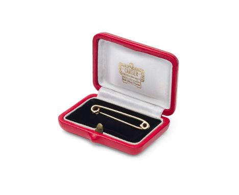  Cartier: A gold tie pin 1978 Designed as a 9 carat gold safety pin, signed Cartier, maker's mark C&F; for Cropp & Farr, Lond