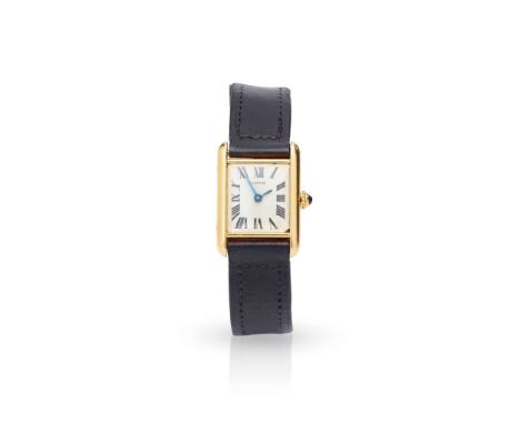  Cartier: A gold rectangular wristwatch "Tank", Numbered 10311, 7746, hallmarked London 1964 Hand-wound mechanical movement, 
