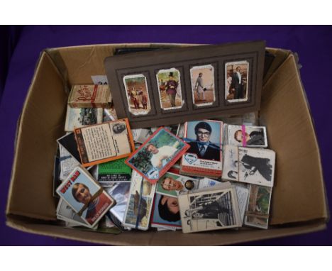 A box of Cigarette and Trade Cards including A &amp; BC Gum, Topps Superman, Footballers,Typhoo etc