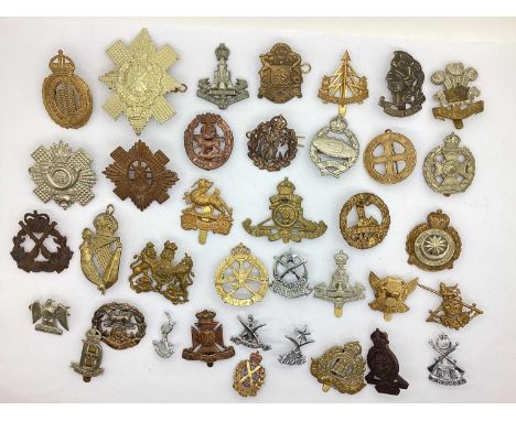 Selection of British Army and Other Nations Cap Badges, including Wiltshire Regiment, Artists Rifles and Royal Tank Regiment 