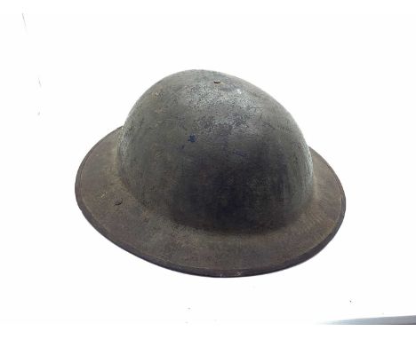 WWI British Army Brodie Mk I steel helmet with part liner and leather strap, marks on the interior of helmet rim 'FS 168 (?)'