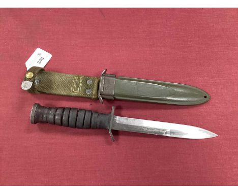 WWII American M3 Trench Knife, marked with 'US M3 Imperial' on knife guard and scabbard, marked with 'US M8 BM Co' on throat.