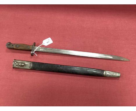 WWI British 1907 Pattern Bayonet and Scabbard, with various marks on blade, including year '16', manufacturer 'Wilkinson' and