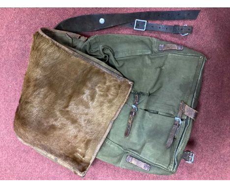 WWII German Army M34 pony hide Tornister back pack with maker mark and date 1937.Due to the nature of these items we politely
