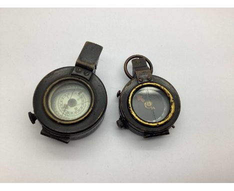 WWI Era Verners Style Prismatic Marching Compass, and WWII prismatic marching compass marked on the base with military arrow 