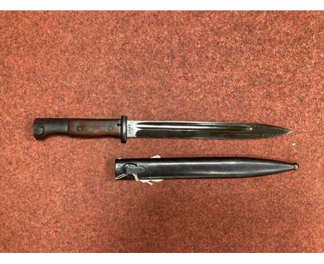 WWII Third Reich German K98 Bayonet and Scabbard, manufacturer mark 'Cue' on both items dated to years '42' and '41' respecti