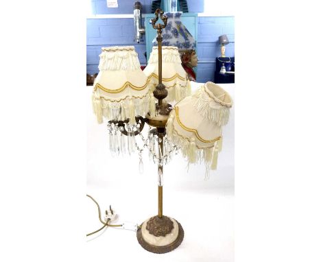 20th Century three light table lamp set with applied foliate brass detail, polished stone base and hanging glass drapes, 74cm