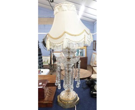 A large lamp and shade cut glass with lustres on shaped metal base with white shade, the lamp 53cm high