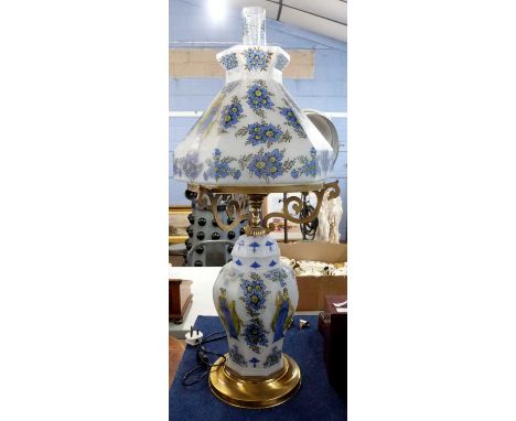 A large table lamp and shade in frosted glass with blue printed decoration of Roman figures and flowers with matching chimney