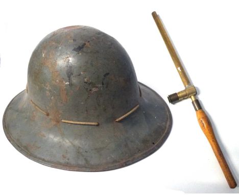 First World War helmet together with a trench periscope by R &amp; J Beck No 28649 dated 1918