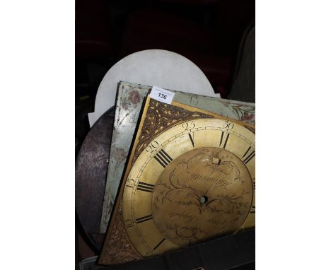 A quantity of long case clock dials, mantel clock movements and other similar items