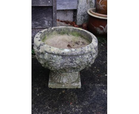 A cast stone planter, 17" dia, on square base