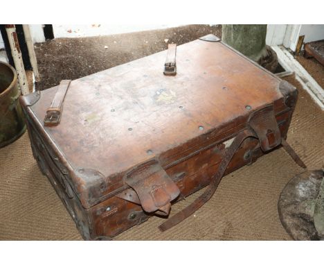 A leather bound trunk, 36" wide x 21 1/2" deep x 12 1/2" high