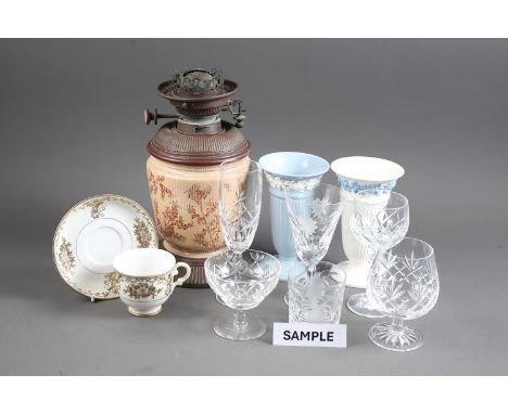 A Noritake part teaset, an oil lamp, and a quantity of glassware, including tumblers, flutes, bowls, bells and other items