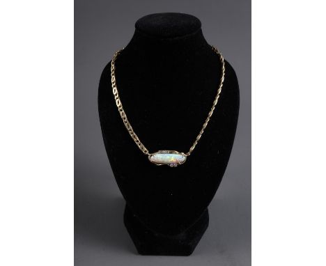 A 18ct gold double curb style chain with shaped opal and diamond set pendant, 21 1/4" long overall, 25g grossCondition:Size o