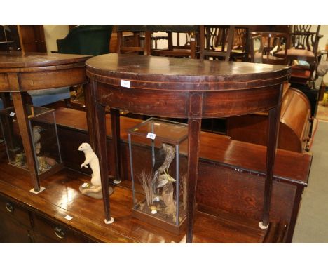 A Georgian mahogany and line inlaid fold-over top semicircular card table, on square taper supports, 36" wide x 18" deep 29 1