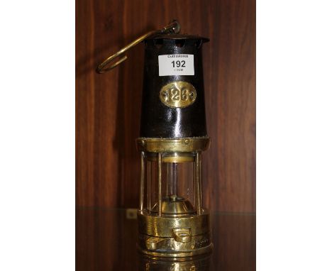 A VINTAGE BRASS MINERS LAMP STAMPED 126 WC &amp; ICOL MARSAIT K NAYLOR WIGAN