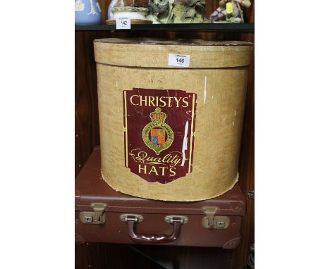 A CHRISTYS HAT BOX CONTAINING A TOP HAT AND BOWLER HAT, TOGETHER WITH A VINTAGE BRIEFCASE 