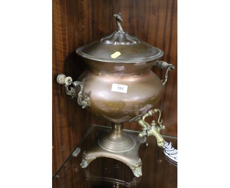 A VINTAGE SAMOVAR WITH HOUND FINIAL