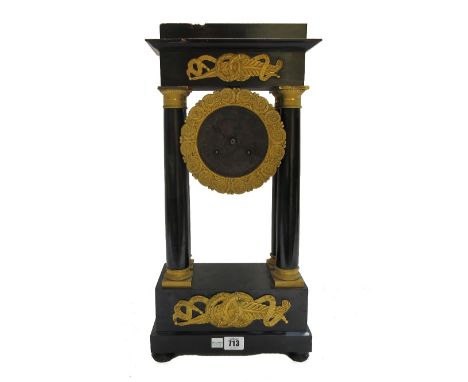 A French ormolu mounted ebonised portico mantel clock, 19th century, the silvered dial enclosing a two train movement with co