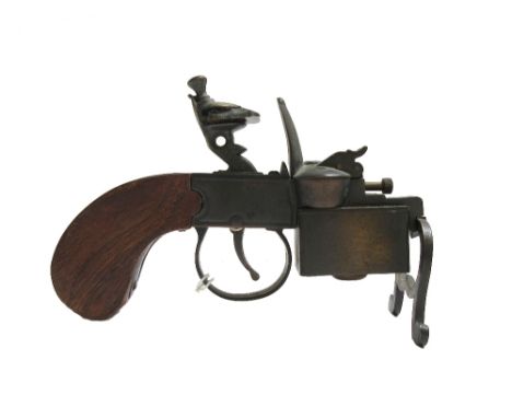 A Dunhill novelty 'tinder pistol' table lighter, circa 1936, with faux flint hammer action and a one piece wooden handle, 14.