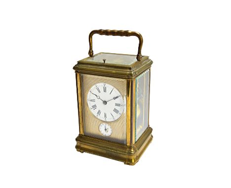 A French grande sonnerie brass gorge cased carriage clock, with alarm, late 19th century, the silvered engine turned surround