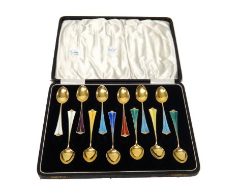 A set of twelve Norwegian silver gilt and vary coloured enamel coffee spoons, detailed D-A 925 S NORWAY STERLING, with an ass