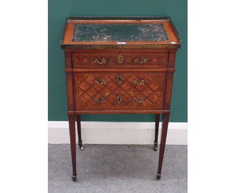 A Louis XVI style gilt metal mounted parquetry inlaid kingwood and tulipwood petite commode, with three drawers, on tapering 
