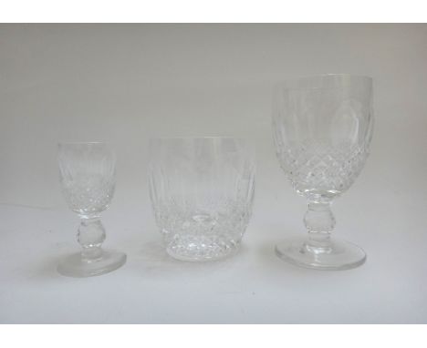 A part suite of Waterford crystal decorated in the 'Colleen' pattern, comprising; five water glasses (13.5cm high), six white