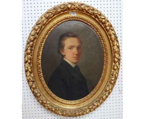 Continental School (19th century), Portrait of a young man, oil on canvas, oval, indistinctly signed, 61cm x 47cm.