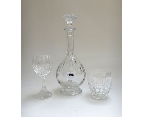A Baccarat part suite of crystal stemware, comprising; a decanter and stopper, twelve wine glasses and six tumblers (19).