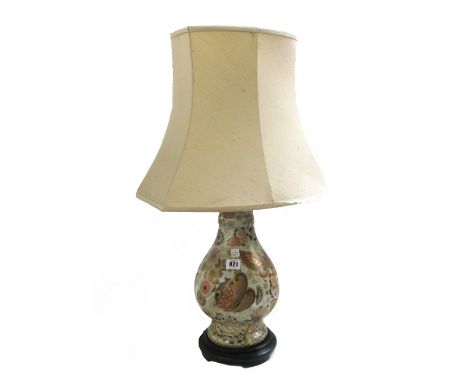 A Japanese satsuma porcelain table lamp, late 20th century, decorated with butterflies and flowers, with a shade, the vase 36