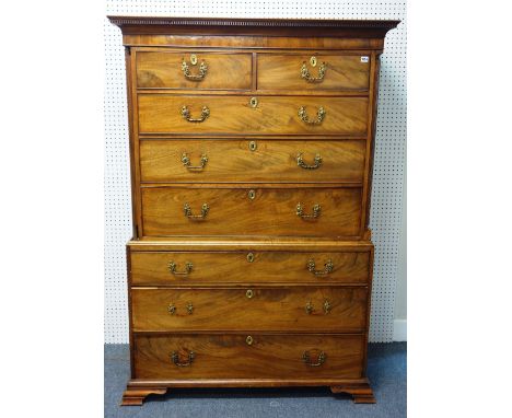 A George III mahogany secretaire chest-on-chest, with two short over five long graduated drawers divided by a fitted drawer, 