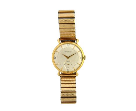 A gentleman's gold circular cased Jaeger-Le Coultre wristwatch, with a signed gilt jewelled lever movement, interior metal du