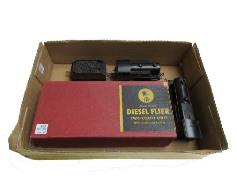 A Trix OO gauge diesel flier electric two coach unit, boxed, a Trix 4-4-0 engine and tender, and a Trix electric tank locomot