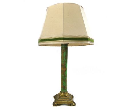 A Victorian gilt green glass and brass mounted table lamp with octagonal shade, 77cm high. 