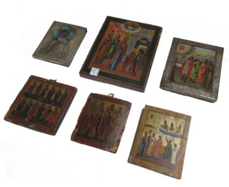 A Russian icon, late 19th century, with silver and enamel oklad, 11cm x 9cm, and five further small Russian icons (6).