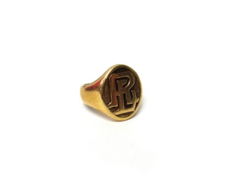 A gentleman's gold oval signet ring, formed as a monogram, detailed 14 K, ring size P and a half, weight 16.7 gms.