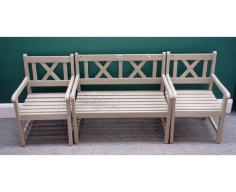 A grey painted child's garden bench with X-frame back, 76cm wide x 65cm high, together with two matching arm chairs (3). 