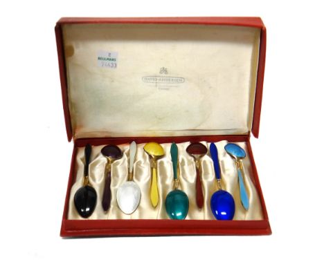 A set of eight Norwegian silver gilt and vary coloured enamel coffee spoons, detailed D-A.NORWAY STERLING 925 S, with a box, 