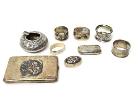 Foreign wares, comprising; two napkin rings, having niello decoration, three further napkin rings, a rectangular cigarette ca