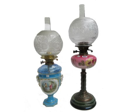 An Edwardian Art Nouveau oil lamp, 'Youngs No 2' with foliate painted pink glass reservoir, pottery base and a cut glass shad
