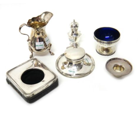 Silver and silver mounted wares, comprising; a cream jug raised on three feet, a pocket watch travelling case, a circular cap