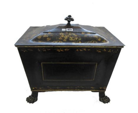 A Regency gilt and ebonised coal purdonium with lion ring handles and lion paw feet gilt foliate decorated. 
