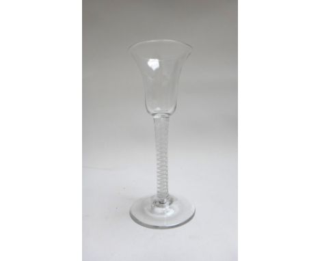 An opaque twist wine glass, circa 1765, the bell bowl raised on a double series opaque twist stem and plain foot, 15.5cm. hig