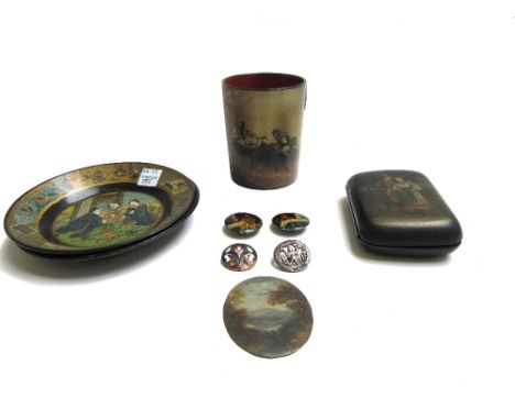 A Russian beaker decorated with a 'Troika' scene, 8.7cm high, a papier mache cigarette case, two plates, an enamel badge and 