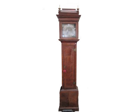 A Victorian walnut eight day longcase clock by Richard Schofield, with caddy top and brass spherical finials, the brass dial 