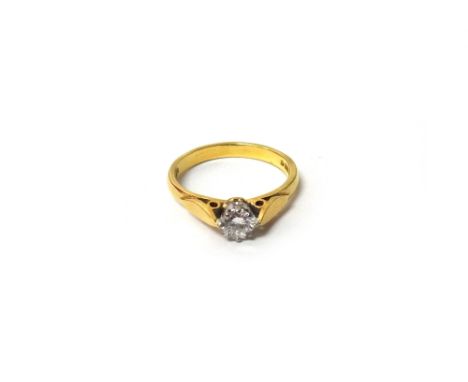 An 18ct gold and diamond single stone ring, claw set with a circular cut diamond, between marquise shaped shoulders, ring siz