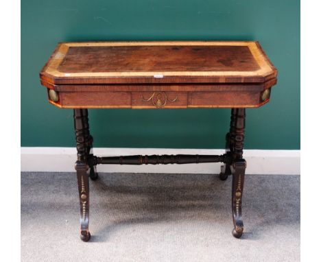 A Regency gilt metal mounted rosewood card table, with canted rectangular top, on four downswept supports, 91cm wide x 76cm h