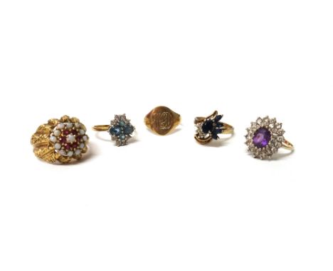 A 9ct gold, ruby and opal set cluster ring, with cast decoration, a 9ct gold, amethyst and colourless gem set cluster ring, t